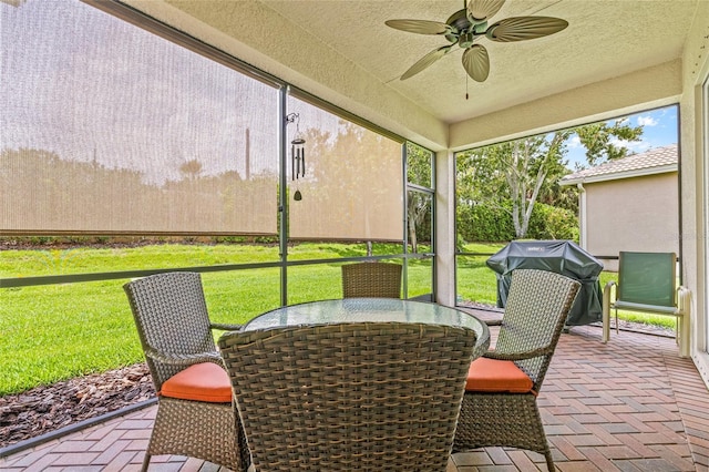 4911 Rock Island Ct, Wimauma, FL 33598 - sunroom / solarium featuring ceiling fan and outdoor dining space