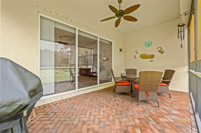 4911 Rock Island Ct, Wimauma, FL 33598 - sunroom / solarium featuring ceiling fan and outdoor dining area