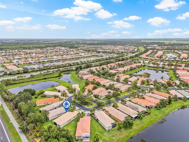 4911 Rock Island Ct, Wimauma, FL 33598 - aerial view of property and surrounding area featuring nearby suburban area and a nearby body of water