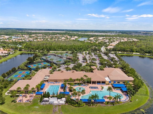 4911 Rock Island Ct, Wimauma, FL 33598 - drone / aerial view of a pool area and a nearby body of water