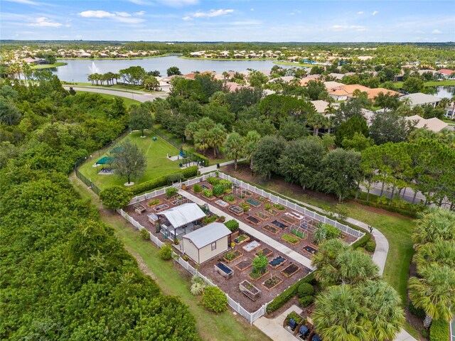 4911 Rock Island Ct, Wimauma, FL 33598 - aerial overview of property's location featuring a nearby body of water and nearby suburban area