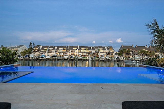 501 Barcelona Dr, Tierra Verde, FL 33715 - view of pool featuring a residential view and a water view