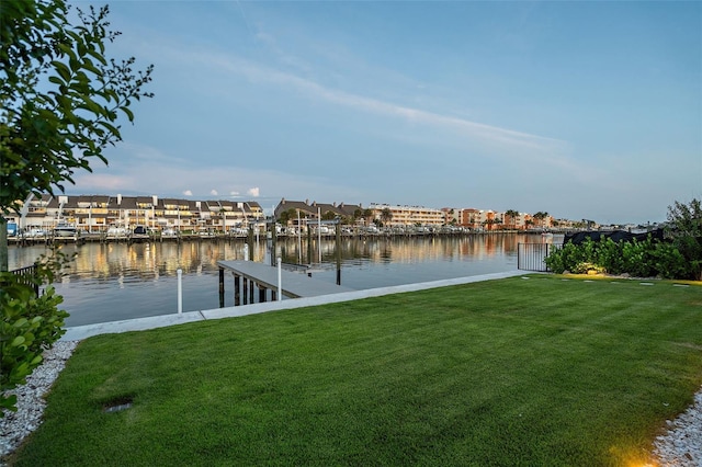 501 Barcelona Dr, Tierra Verde, FL 33715 - dock featuring a lawn and a water view