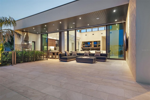 501 Barcelona Dr, Tierra Verde, FL 33715 - view of patio featuring an outdoor living space with a fire pit
