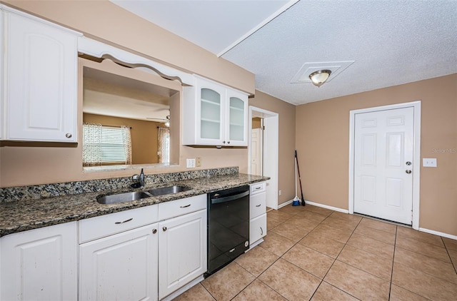 2003 Whispering Pines St, Largo, FL 33774 - kitchen featuring dishwasher, glass insert cabinets, white cabinetry, ceiling fan, and a textured ceiling