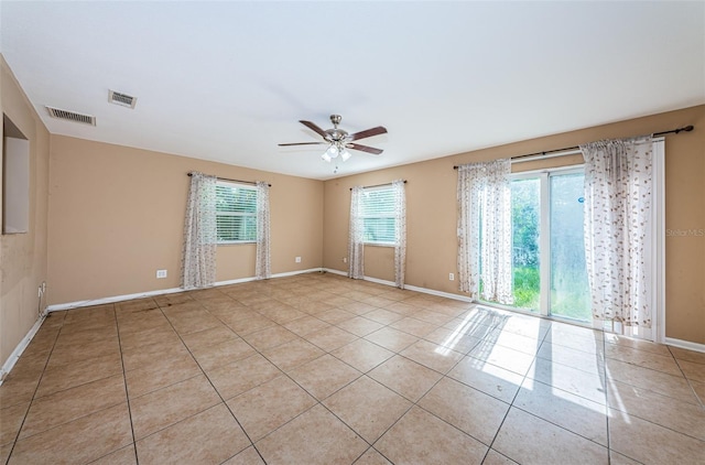 2003 Whispering Pines St, Largo, FL 33774 - spare room with ceiling fan and light tile patterned flooring