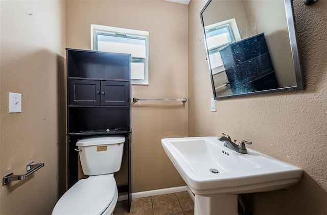 2003 Whispering Pines St, Largo, FL 33774 - bathroom featuring toilet and tile patterned flooring