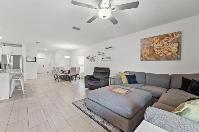 9815 Carabiner Way, Land O Lakes, FL 34637 - living room with a ceiling fan and recessed lighting