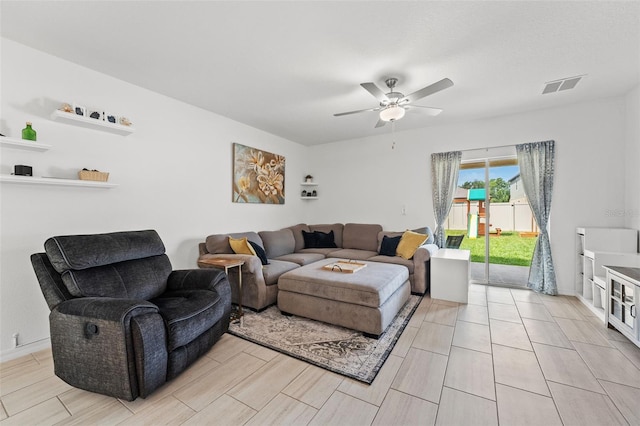 9815 Carabiner Way, Land O Lakes, FL 34637 - living room featuring ceiling fan and wood tiled floors