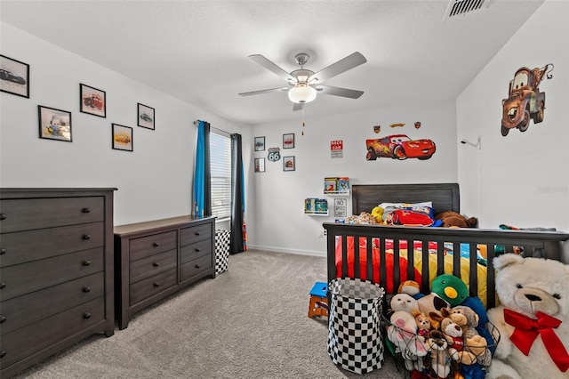 9815 Carabiner Way, Land O Lakes, FL 34637 - bedroom featuring light colored carpet and ceiling fan