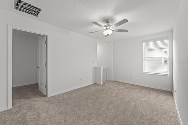 9815 Carabiner Way, Land O Lakes, FL 34637 - carpeted empty room with ceiling fan and baseboards