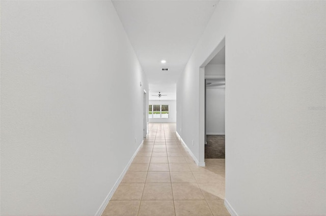 36618 Garden Wall Way, Zephyrhills, FL 33541 - hallway featuring light tile patterned flooring and recessed lighting