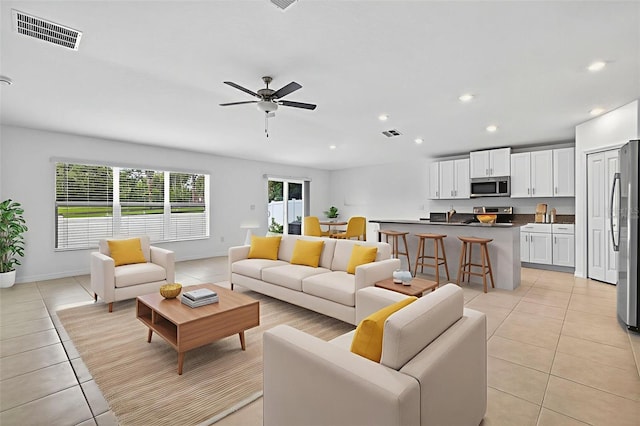 36618 Garden Wall Way, Zephyrhills, FL 33541 - living area with light tile patterned flooring, recessed lighting, and a ceiling fan
