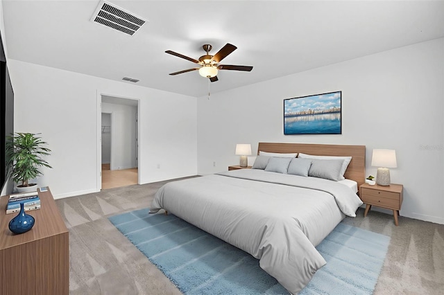 36618 Garden Wall Way, Zephyrhills, FL 33541 - bedroom featuring light colored carpet and a ceiling fan