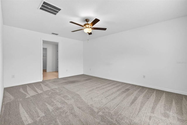 36618 Garden Wall Way, Zephyrhills, FL 33541 - carpeted spare room with a ceiling fan and baseboards