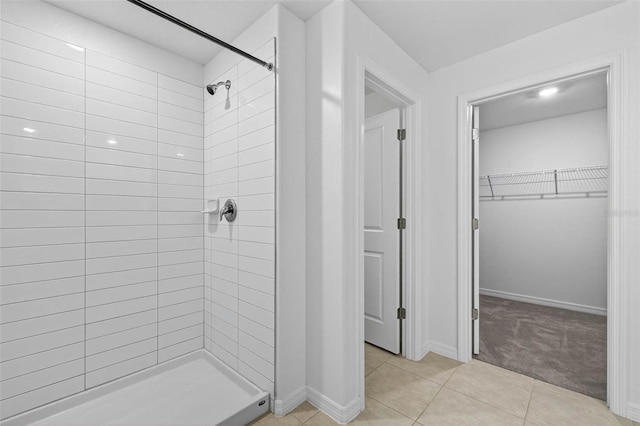36618 Garden Wall Way, Zephyrhills, FL 33541 - full bathroom with a shower stall, tile patterned flooring, and a spacious closet