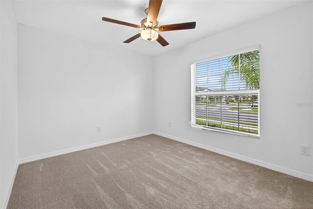 36618 Garden Wall Way, Zephyrhills, FL 33541 - carpeted empty room featuring baseboards and a ceiling fan