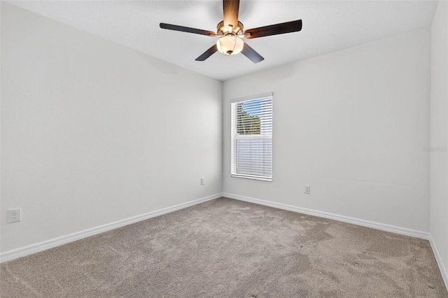 36618 Garden Wall Way, Zephyrhills, FL 33541 - empty room featuring a ceiling fan and carpet