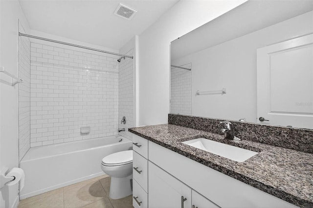 36618 Garden Wall Way, Zephyrhills, FL 33541 - bathroom with vanity, bathing tub / shower combination, and tile patterned flooring