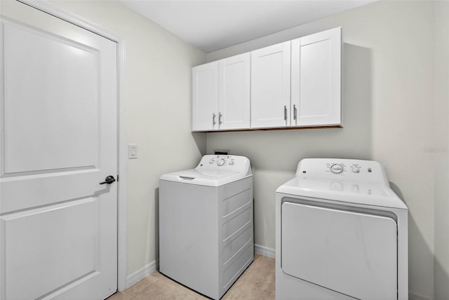 36618 Garden Wall Way, Zephyrhills, FL 33541 - laundry area featuring cabinet space and washing machine and clothes dryer