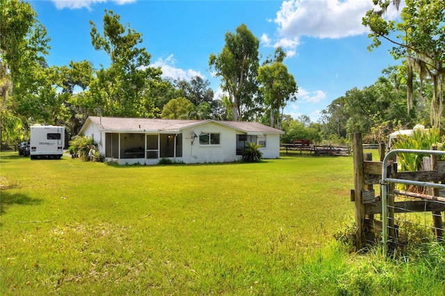 12631 Hobson Simmons Rd, Lithia, FL 33547 - view of yard featuring a sunroom and view of scattered trees