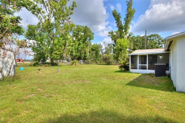 12631 Hobson Simmons Rd, Lithia, FL 33547 - view of yard featuring a sunroom