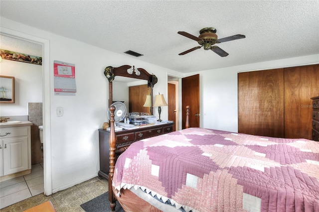12631 Hobson Simmons Rd, Lithia, FL 33547 - bedroom featuring a textured ceiling, ceiling fan, and light tile patterned floors