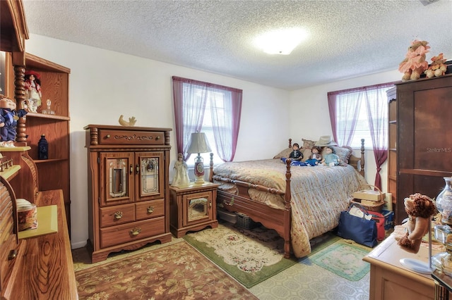 12631 Hobson Simmons Rd, Lithia, FL 33547 - bedroom with a textured ceiling