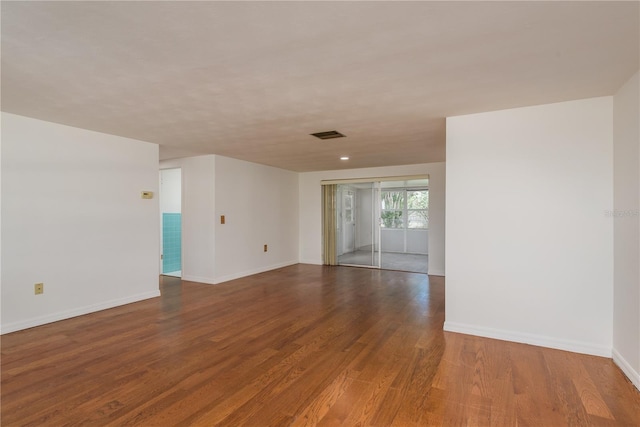 3547 Morley Dr, New Port Richey, FL 34652 - spare room with wood finished floors and baseboards