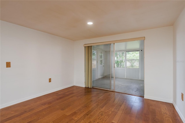 3547 Morley Dr, New Port Richey, FL 34652 - empty room featuring wood finished floors and recessed lighting