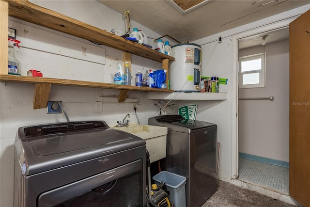 3547 Morley Dr, New Port Richey, FL 34652 - washroom featuring washer and clothes dryer and electric water heater