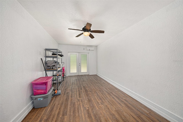 5065 Royal Palms Way Unit 303, New Port Richey, FL 34652 - empty room featuring wood finished floors, a ceiling fan, and a textured wall
