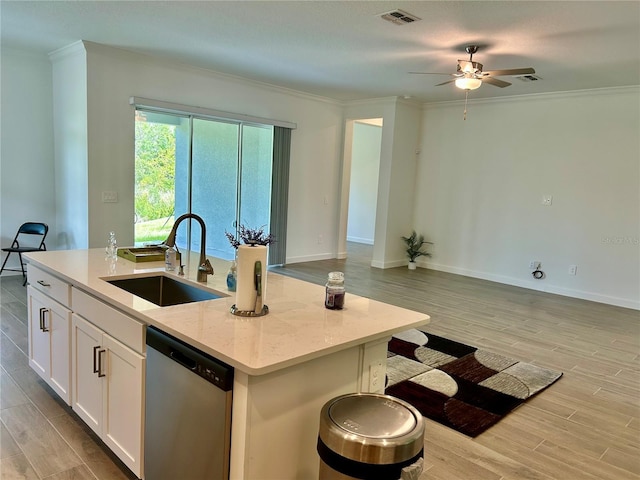 10864 Banyan Breeze Blvd, Land O Lakes, FL 34638 - kitchen featuring stainless steel dishwasher, open floor plan, crown molding, ceiling fan, and light wood finished floors