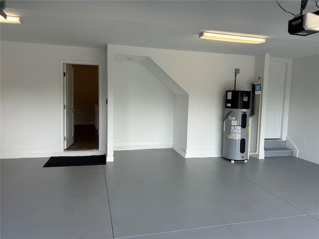 10864 Banyan Breeze Blvd, Land O Lakes, FL 34638 - garage featuring hybrid water heater and a garage door opener