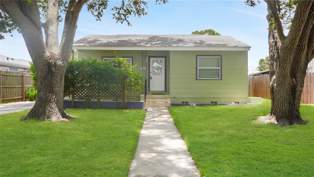 5725 18th Ave S, Gulfport, FL 33707 - bungalow-style home featuring entry steps and roof with shingles