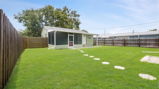 5725 18th Ave S, Gulfport, FL 33707 - fenced backyard with a sunroom