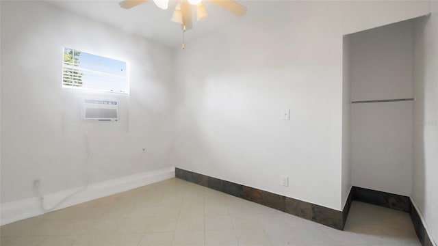 5725 18th Ave S, Gulfport, FL 33707 - unfurnished room with a ceiling fan and baseboards