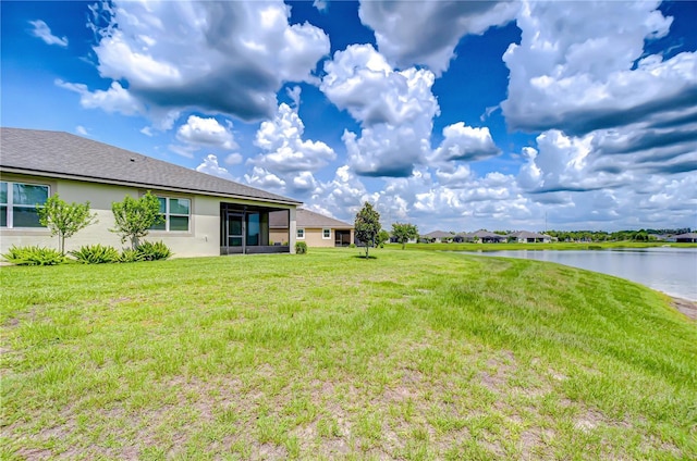 11619 Cambium Crown Dr, Riverview, FL 33569 - view of green lawn featuring a water view and a sunroom