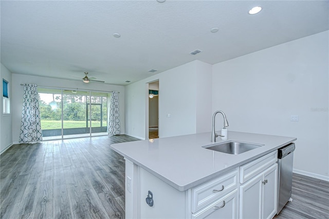 11619 Cambium Crown Dr, Riverview, FL 33569 - kitchen featuring dishwasher, open floor plan, a ceiling fan, light wood-style flooring, and a center island with sink