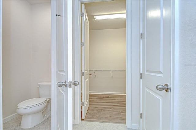11619 Cambium Crown Dr, Riverview, FL 33569 - bathroom featuring toilet and tile patterned flooring