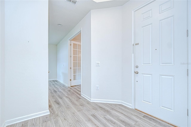 11619 Cambium Crown Dr, Riverview, FL 33569 - foyer featuring light wood-style floors and baseboards