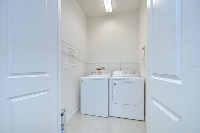 11619 Cambium Crown Dr, Riverview, FL 33569 - laundry room with washer and dryer and baseboards