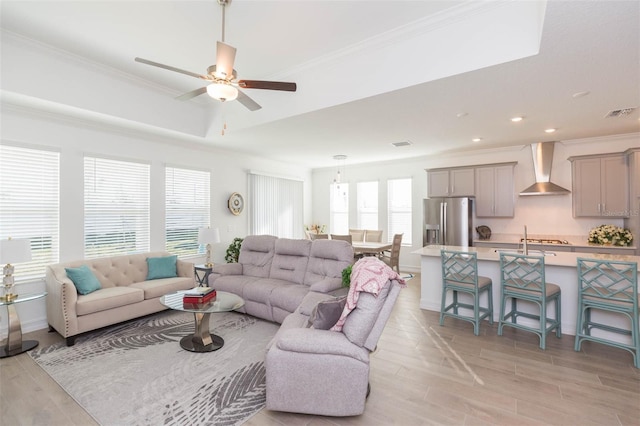 11717 74th Cir E, Palmetto, FL 34221 - living room with crown molding, a ceiling fan, light wood finished floors, and recessed lighting