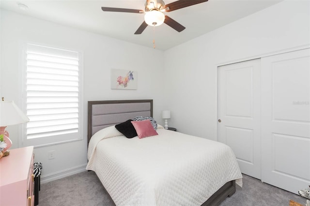 11717 74th Cir E, Palmetto, FL 34221 - bedroom with carpet, a closet, and a ceiling fan