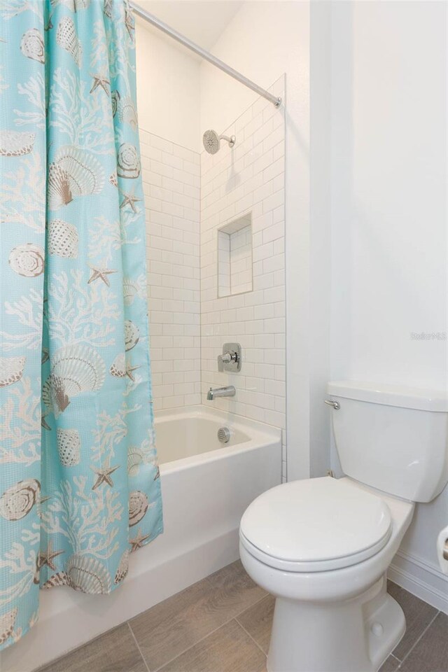 11717 74th Cir E, Palmetto, FL 34221 - full bath with shower / tub combo with curtain and wood tiled floors
