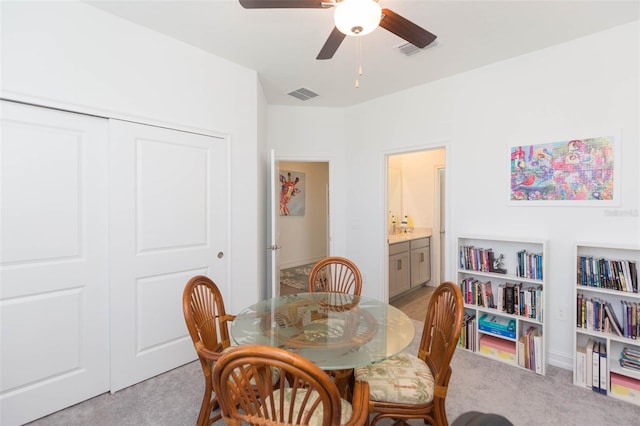11717 74th Cir E, Palmetto, FL 34221 - dining space with light carpet and a ceiling fan
