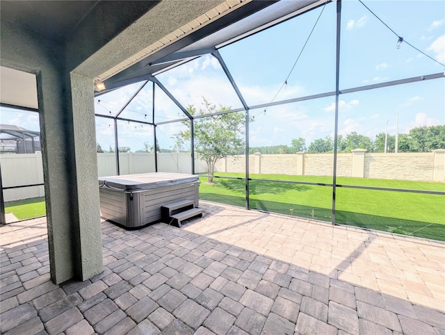 32599 Natural Bridge Rd, Wesley Chapel, FL 33543 - fenced backyard featuring a hot tub, a patio area, and glass enclosure