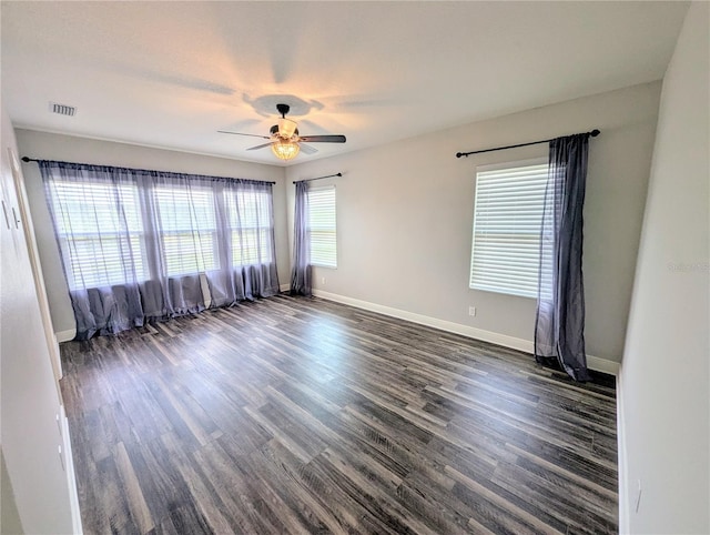 32599 Natural Bridge Rd, Wesley Chapel, FL 33543 - unfurnished room with ceiling fan and dark wood-type flooring