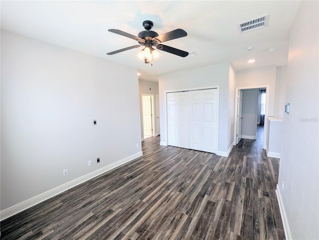 32599 Natural Bridge Rd, Wesley Chapel, FL 33543 - unfurnished bedroom featuring dark wood-style flooring, a closet, recessed lighting, and a ceiling fan