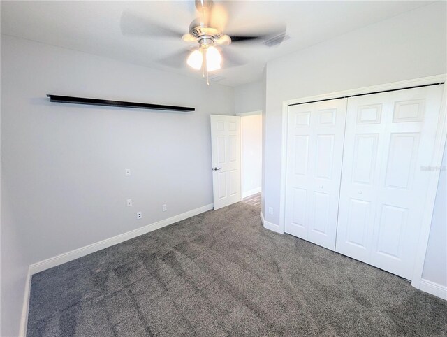 32599 Natural Bridge Rd, Wesley Chapel, FL 33543 - unfurnished bedroom with carpet floors, a closet, and a ceiling fan